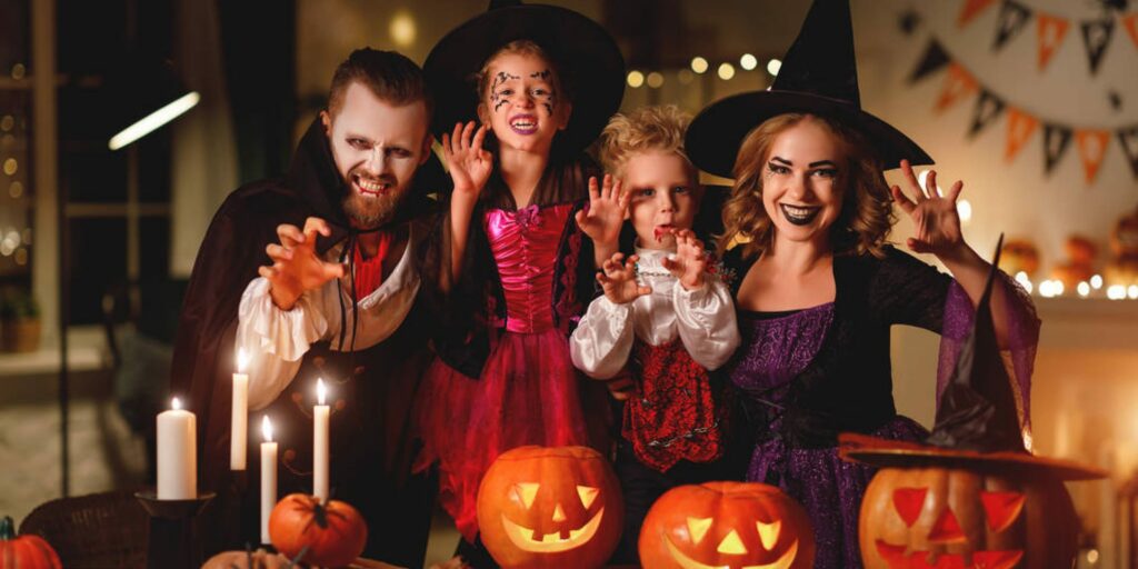 Family dressed up for Hallowene party with decorations